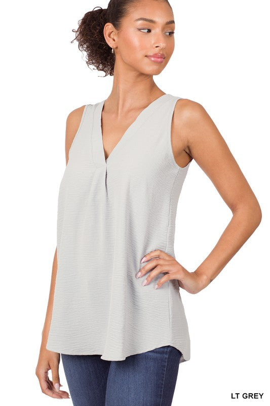 WOVEN AIRFLOW V-NECK SLEEVELESS