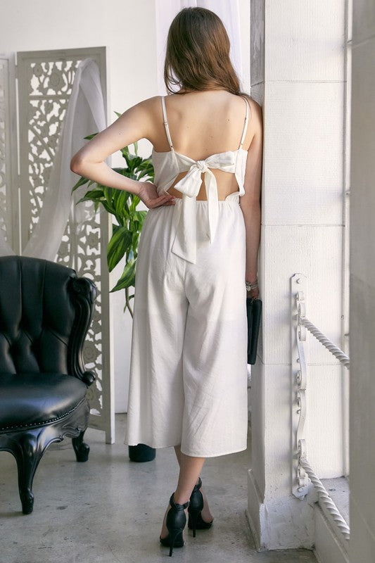 CUTOUT BOW DETAIL JUMPSUIT WITH CROPPED WIDE LEG