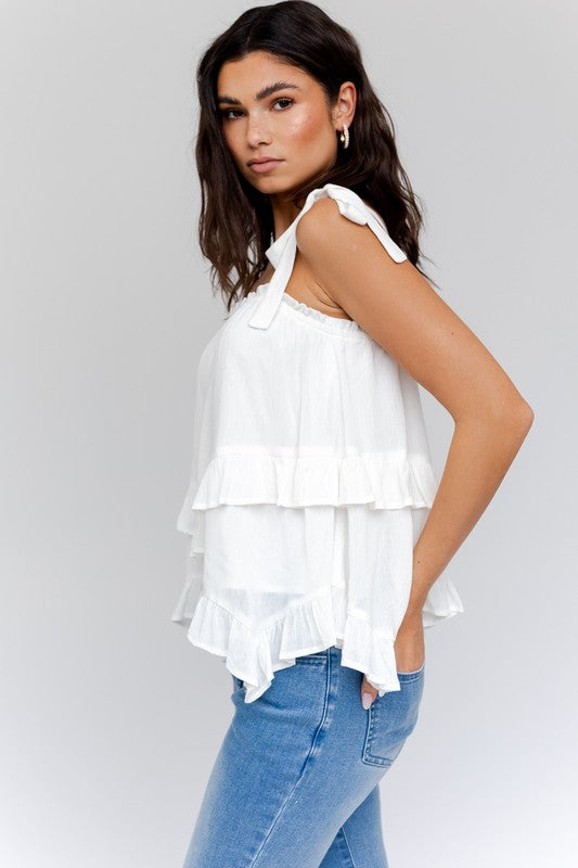 SLEEVELESS ASYMMETRICAL HEM LINE TIERED TOP