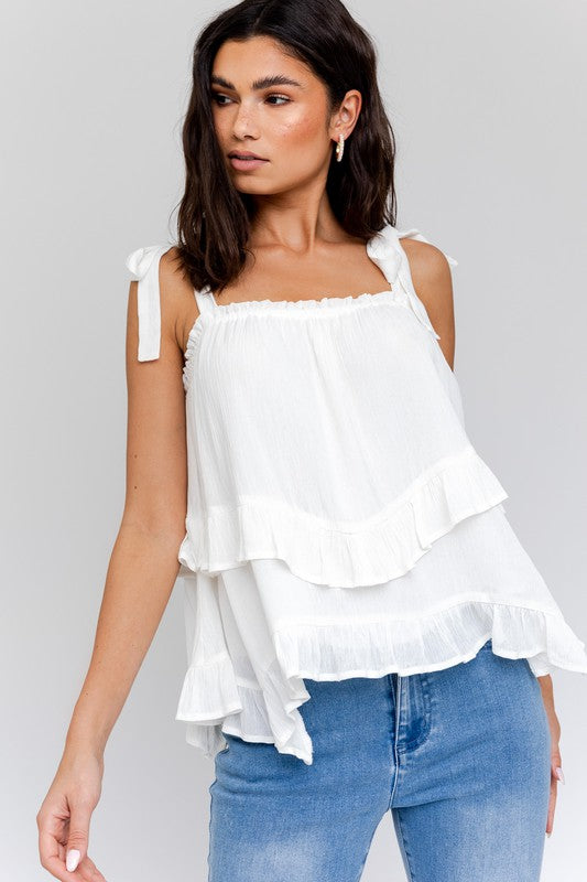 SLEEVELESS ASYMMETRICAL HEM LINE TIERED TOP