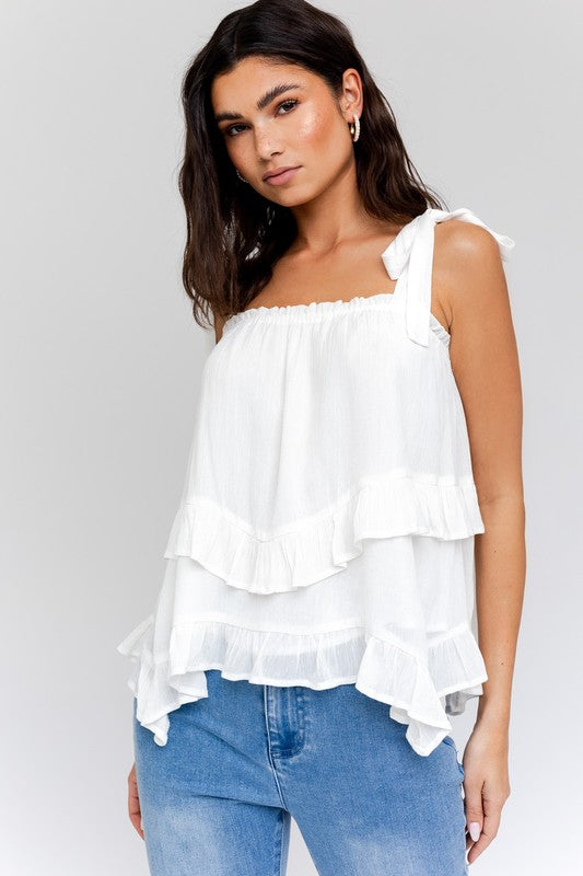 SLEEVELESS ASYMMETRICAL HEM LINE TIERED TOP