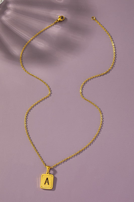 Brass diamond dust cut out initial necklace