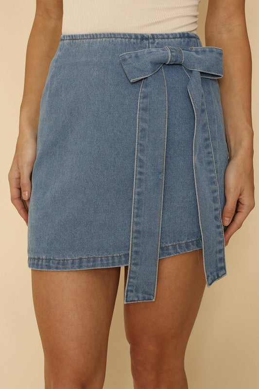 Asymmetrical denim bow skirt