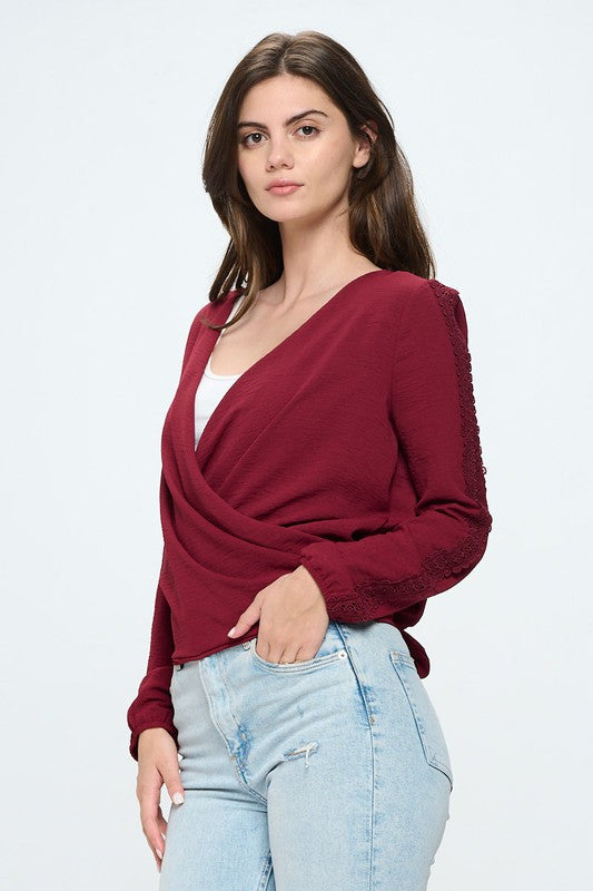 Surplice long sleeve with lace insert blouse